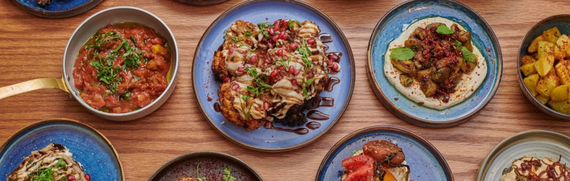 An array of dishes at Imad's Syrian Kitchen