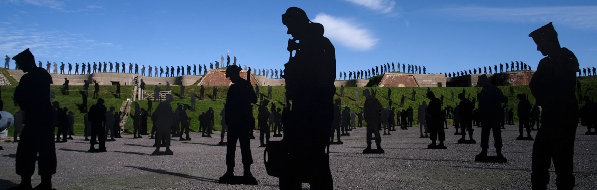 Standing with Giants: For Your Tomorrow - an installation of silhouettes representing British Servicemen  who died on D-Day. Image is of the installation in Normandy. Photograph by Amanda Walden