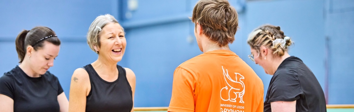 Student learn to play volleyball