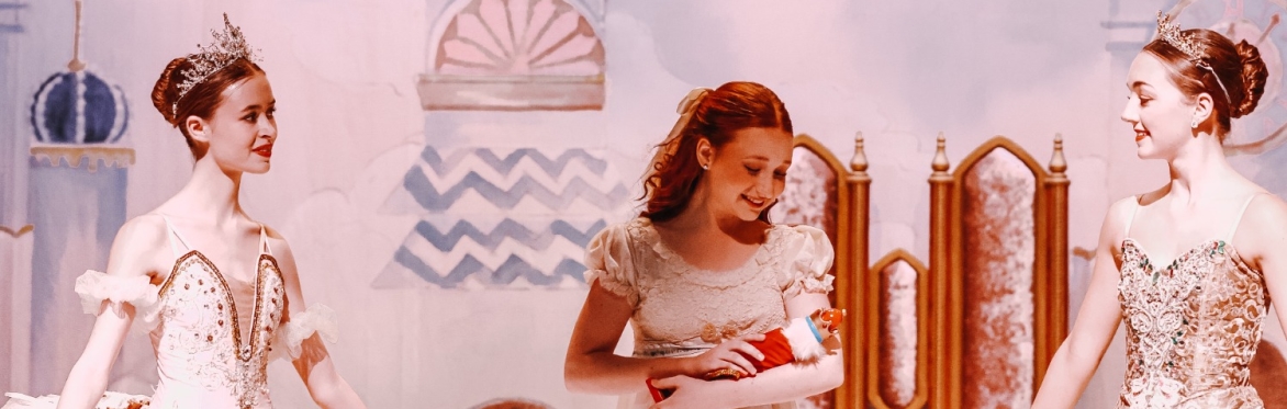 Clara holding the Nutcracker