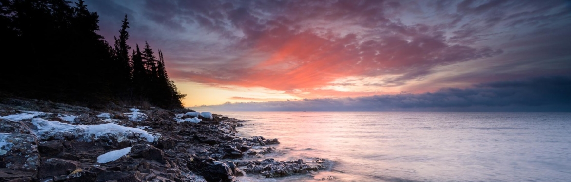 A photo of sunrise over Lake Superior edited in Lightroom
