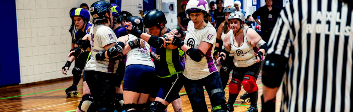 A2 Roller Derby jammer skates around opposing players.