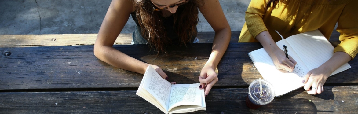 https://unsplash.com/photos/woman-reading-book-while-sitting-on-chair-omeaHbEFlN4