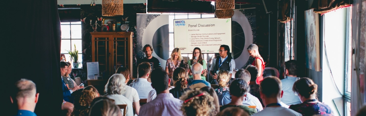 An event taking place with an audience watching a presentation