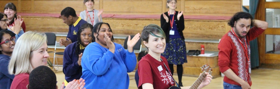 musicians with others clapping (