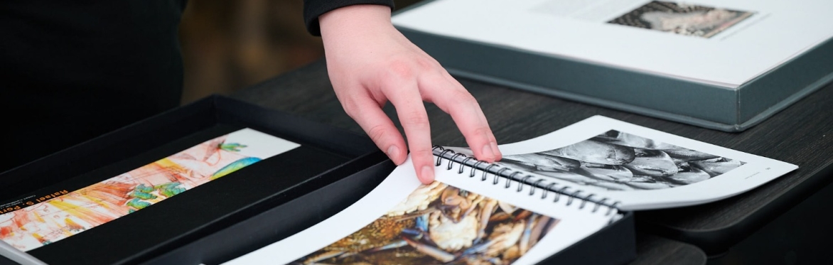 Intro to Portfolios Workshop. Image of a portfolio book opened up.