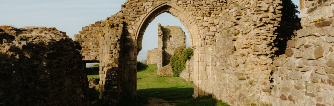 View through the arches of the ruins of Hastings Caste