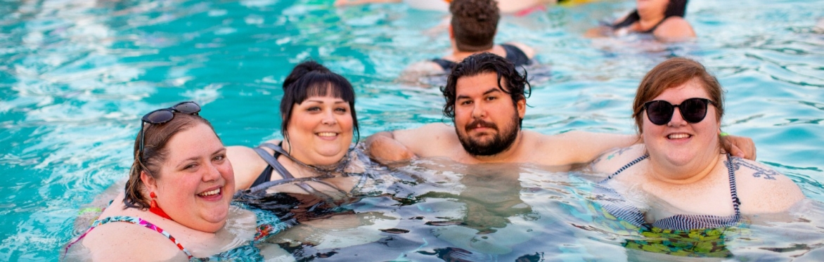4 friends enjoying the pool
