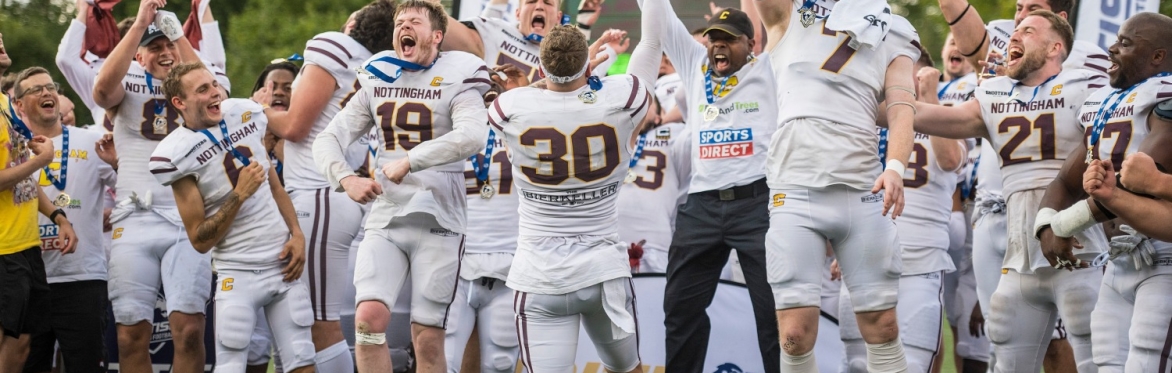 American football players celebrating winning a Bowl game.