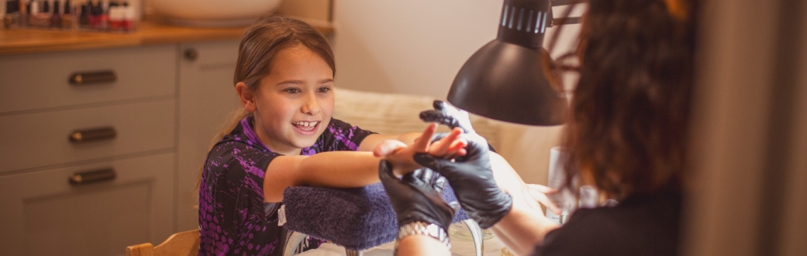 Tween having a pampering spa treatment
