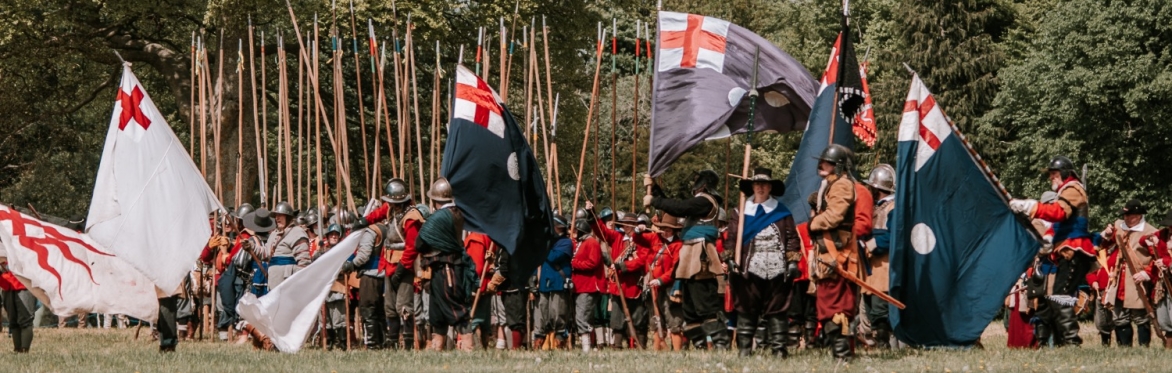 17th century soldiers with flags waving