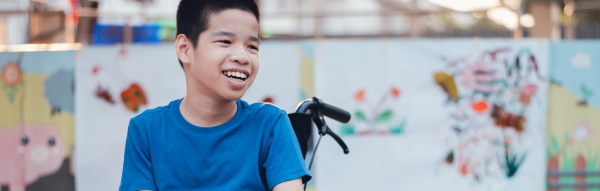 Smiling boy in wheelchair
