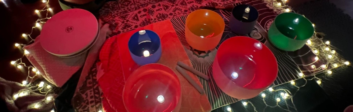 Crystal singing bowls with lights all around them, soundbath in castle donington