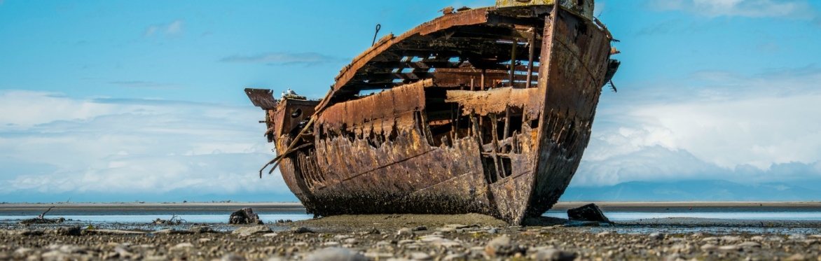 a shipwreck on a sea shore