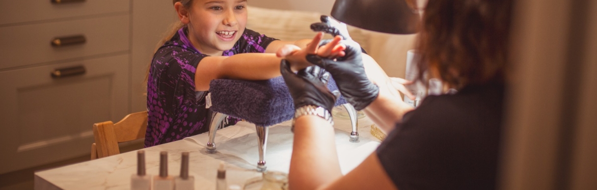 Tween having a pampering spa treatment