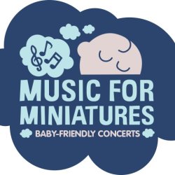 Audience members - parents with babies and toddlers. Some sitting on chairs, others on the floor.