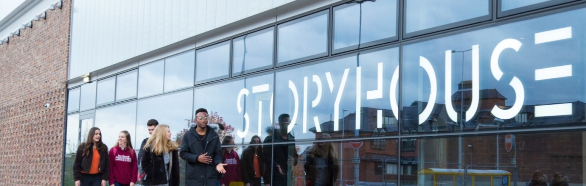 Storyhouse building Chester with people waking past