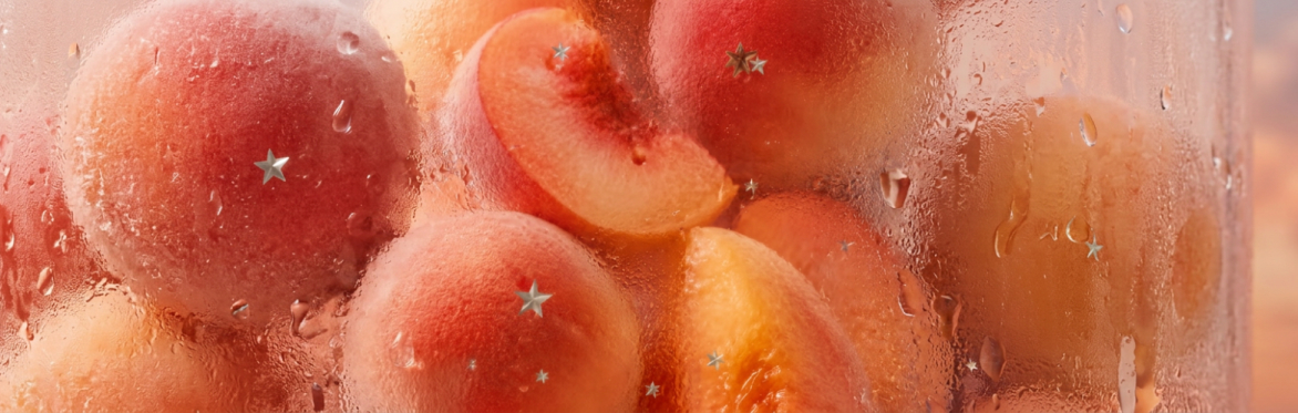 Strawberries floating in front of a sunset