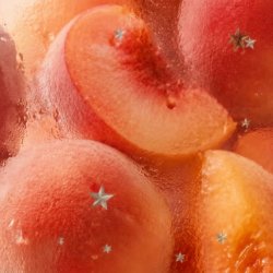 Strawberries floating in front of a sunset