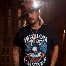 bryan white, music artist wearing a country hat short sleeve shirt and tattoos..