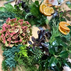 A Christmas wreath with dried oranges