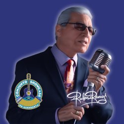 Grammy Award-winning Tejano legend Ruben Ramos holding a vintage microphone, promoting the 2026 Conjunto Showcase en Minnesota Grand Baile.