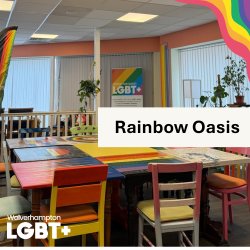 An image showing the event venue, with brightly decorated tables and chairs in the pride colours. There are a variety of plants in the background as well as banners representing the WLGBT+ charity.