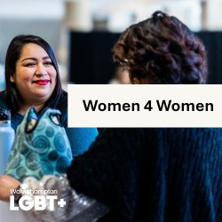 An image showing two women in conversation.