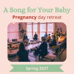 A seated circle of pregnant women in a softly lit room