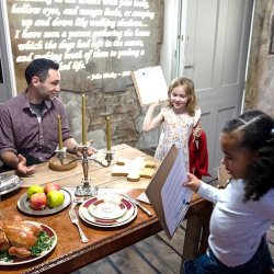 Parents and kids enjoy their museum visit.