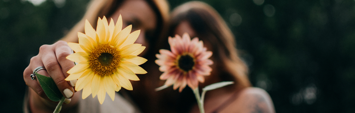 Women holding flowers