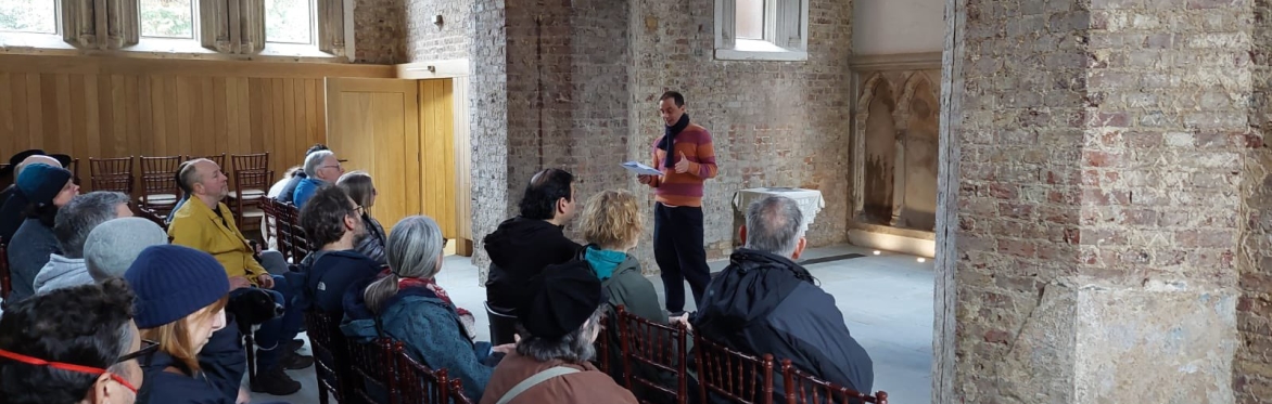 A group listen to a talk in Abney Park's restored chapel.