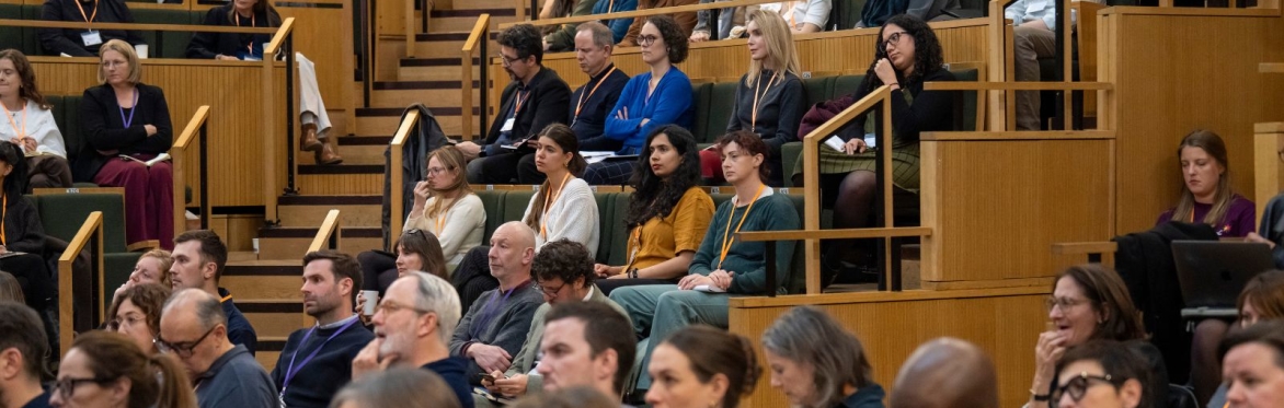 People sat watching a keynote