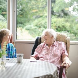 This is an image of two people at a day centre.