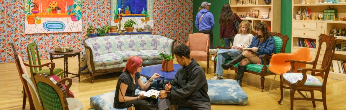 Visitors gathered in a living room setting