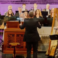 Resurgam Choir singing with chamber organ and Baroque harp, with conductor Mark Duley directing