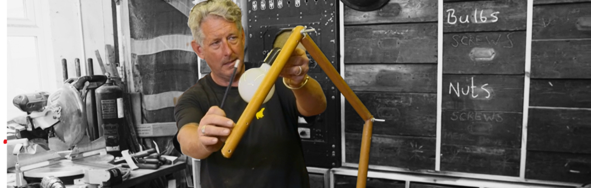 Duncan in his workshop teaching others how to make a light