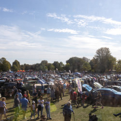 Thousands of people enjoying the Classic Car Show on a bright sunny day