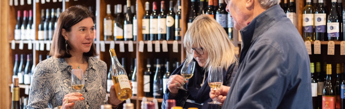 people sample wines