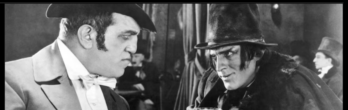 John Barrymore (right) as Mr. Hyde