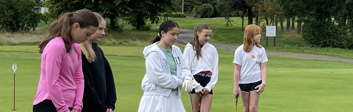 Smiling girls enjoying Girls' Golf at Bearsden Golf Club