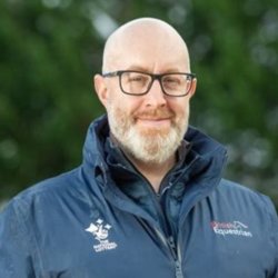 Master Farrier Ben Benson wearing a British Equestrian team jacket