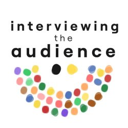 A colorful arrangement of blobs in a half circles 3 rows deep.  They are facing two larger blobs, one is yellow and looks to have left an empty spot in the audience.  "Interviewing the Audience"