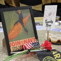 a Navy recruitment advertisement on a table