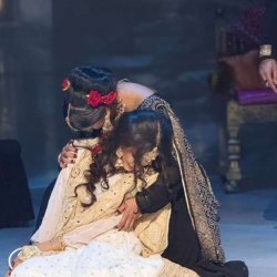A performer portraying Razia comforts Anarkali, who has just been condemned to be buried alive by the emperor, in a scene from Anarkali Reimagined, produced by Dreamers HTX.