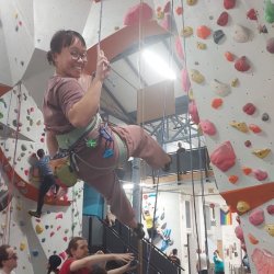 One person climbing, one person belaying