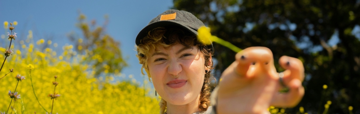 https://unsplash.com/photos/portrait-of-a-nonbinary-autistic-person-outdoors-4DaoOT33dHc