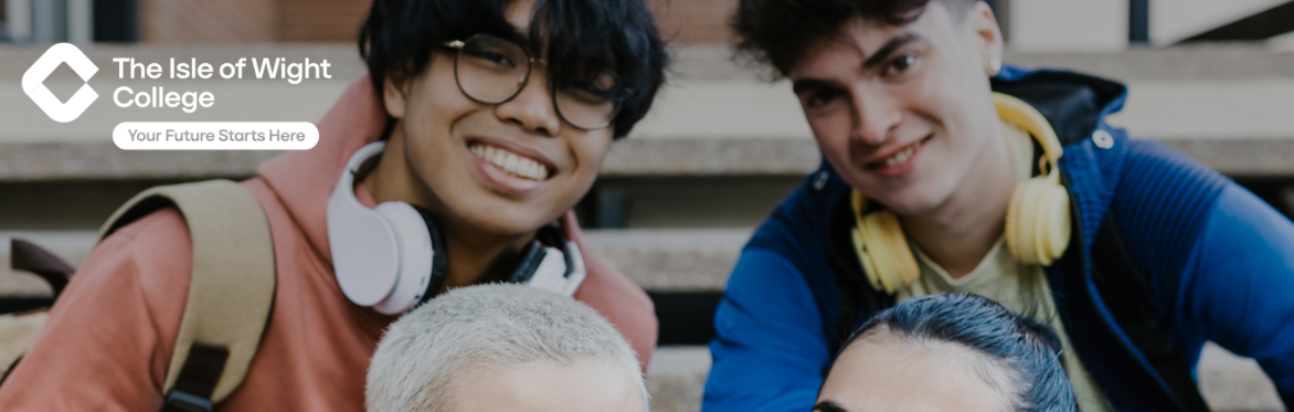 Four happy looking students sitting on a step.