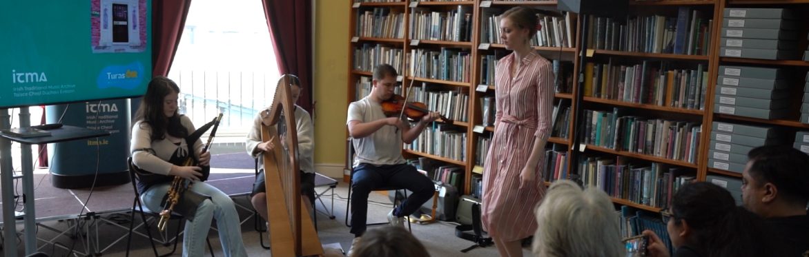three musicians and a dancer in the Irish Traditional Music Archive