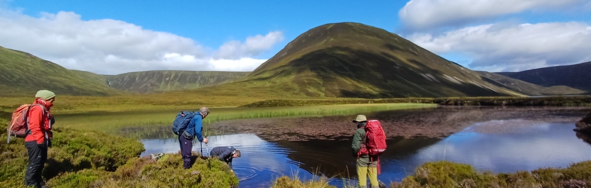 BSBI botanists surveying aquatic plants in a lochan high on the Dalnacardoch Estate, East Perthshire (c) Sam Buckland, Durrell Wildlife Trust